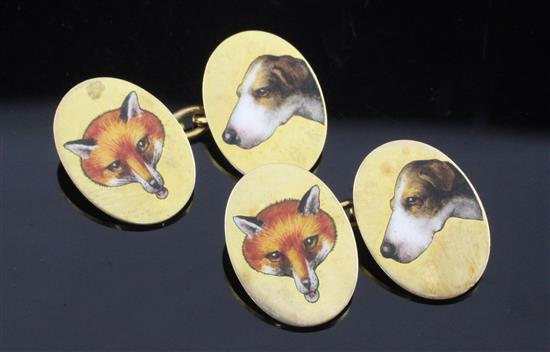 A pair of early 20th century 9ct gold and enamel hunting related fox and hound oval cufflinks,